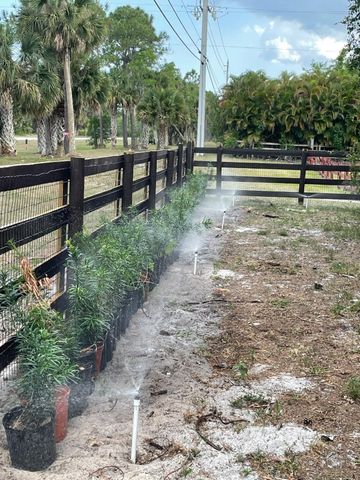 1030 Stallion Drive W, The Acreage, FL 33470