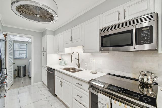 3505 TARPON WOODS BOULEVARD P404, Palm Harbor, FL 34685