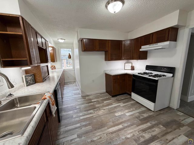 1115 SW Woodward AVE, Topeka, KS 66605