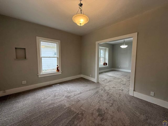 1115 SW Woodward AVE, Topeka, KS 66605