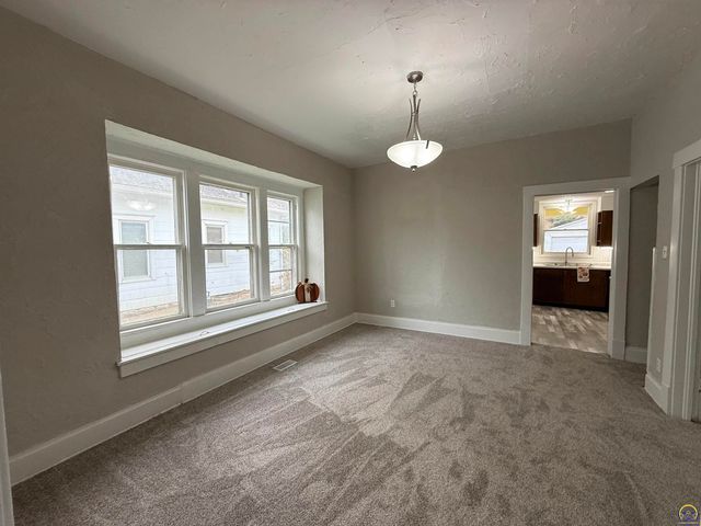 1115 SW Woodward AVE, Topeka, KS 66605