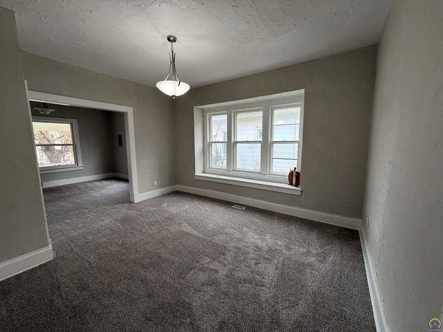 1115 SW Woodward AVE, Topeka, KS 66605