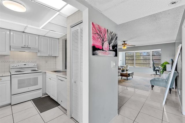 8852 W Mcnab Road 203, Tamarac, FL 33321