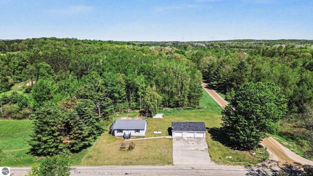 7032 N Woodruff Road, Weidman, MI 48893