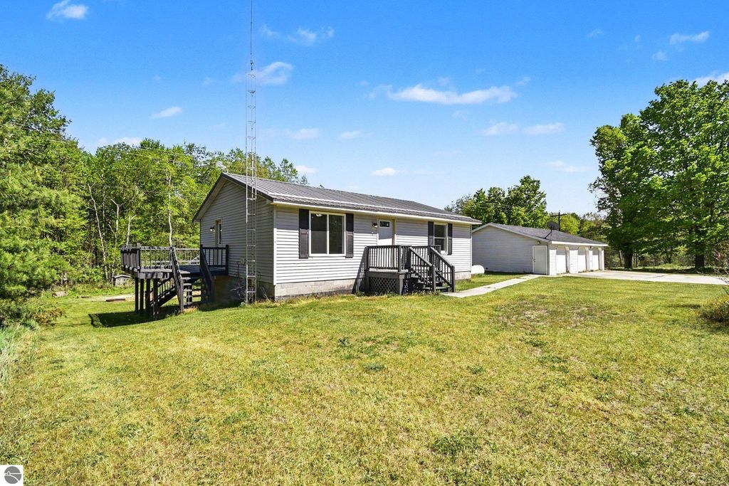 Image 1 of property listing at 7032 N Woodruff Road, Weidman, MI 48893
