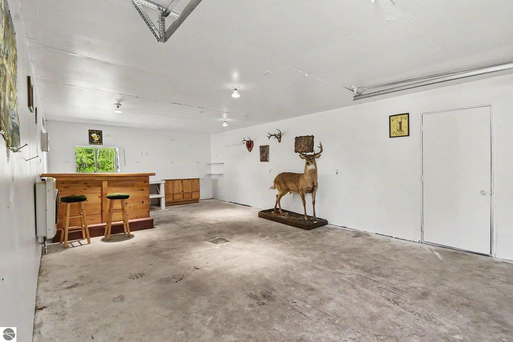 Image 15 of property listing at 7032 N Woodruff Road, Weidman, MI 48893
