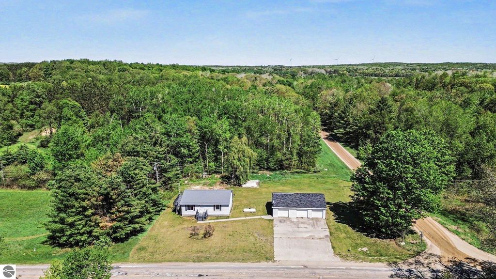 Image 3 of property listing at 7032 N Woodruff Road, Weidman, MI 48893