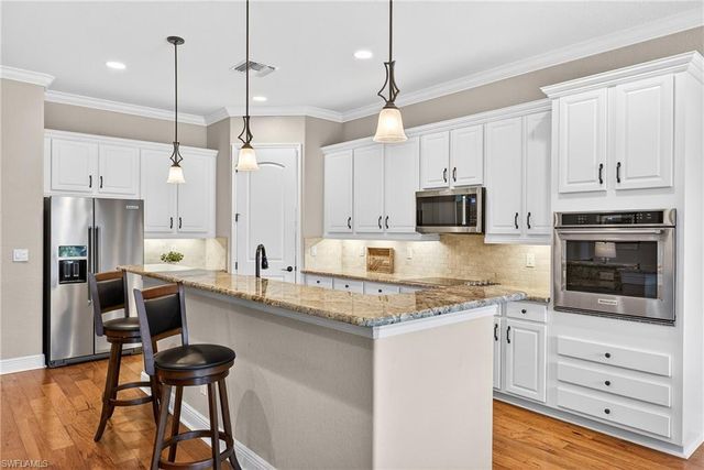 1489 Serrano CIR, Naples, FL 34105