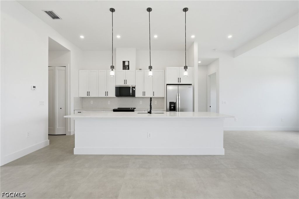 Image 15 of property listing at 227 NE 15th ST, Cape Coral, FL 33909