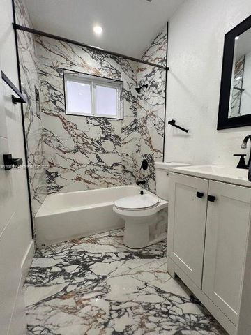 2620 NW 18th Ter 1-4, Oakland Park, FL 33311