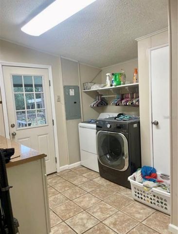 8809 TREASURE ISLAND ROAD, Leesburg, FL 34788