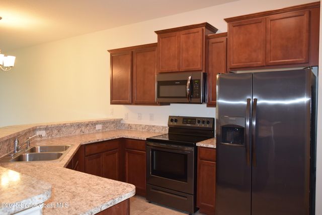 620 Remington Green Drive SE 103, Palm Bay, FL 32909