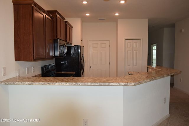 620 Remington Green Drive SE 103, Palm Bay, FL 32909