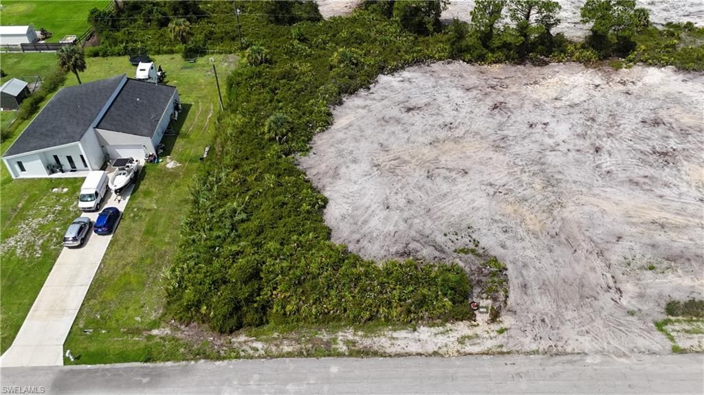 1215 Poinsettia AVE, LEHIGH ACRES, FL 33972 — exterior