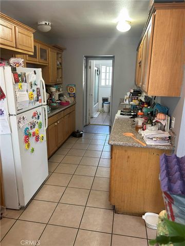 1743 -45 W 60th Place, Los Angeles, CA 90047