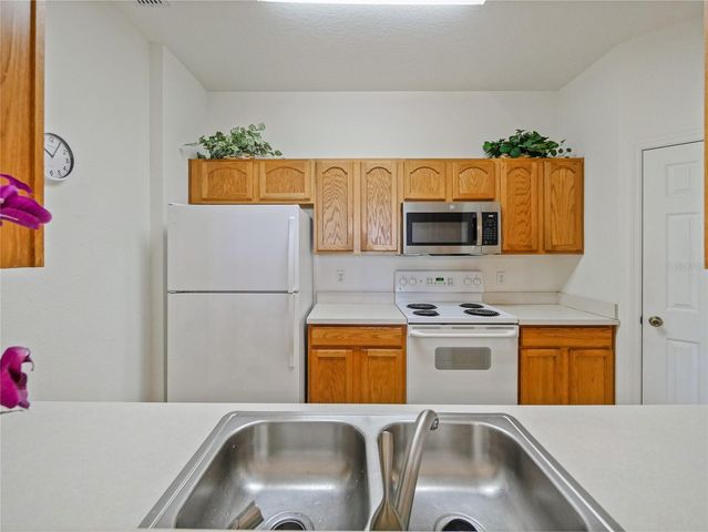 7675 COMROW STREET 402, Kissimmee, FL 34747