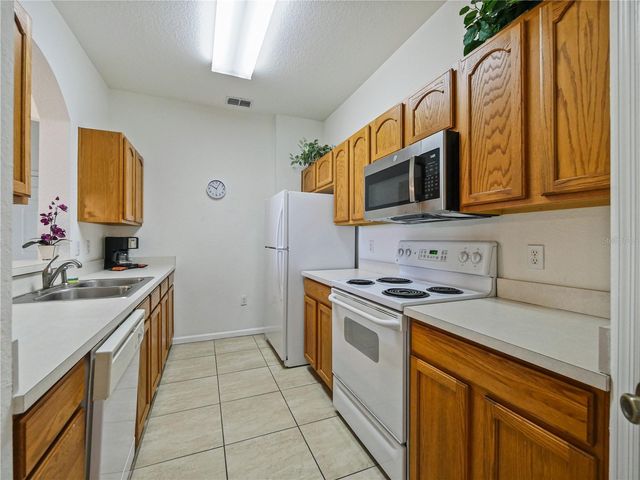 7675 COMROW STREET 402, Kissimmee, FL 34747