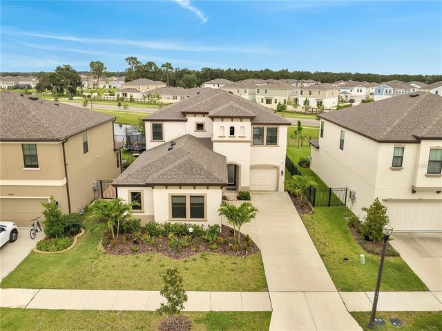 14825 PADDOCK POND AVENUE, Lithia, FL 33547