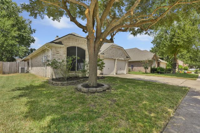 18619 Woodbreeze Drive, Humble, TX 77346