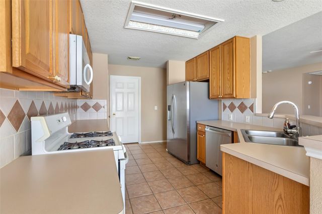 18619 Woodbreeze Drive, Humble, TX 77346