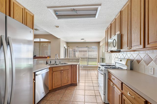 18619 Woodbreeze Drive, Humble, TX 77346