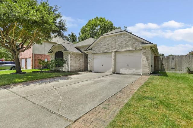 18619 Woodbreeze Drive, Humble, TX 77346