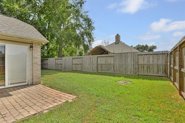 18619 Woodbreeze Drive, Humble, TX 77346
