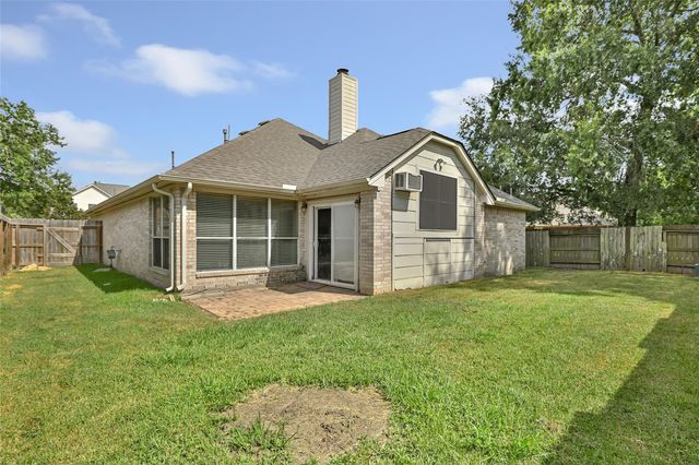 18619 Woodbreeze Drive, Humble, TX 77346