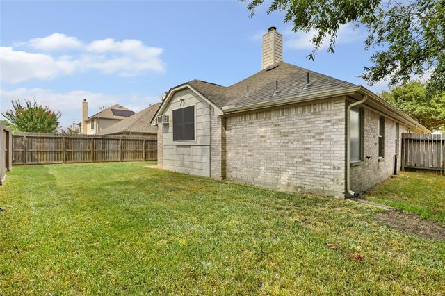 18619 Woodbreeze Drive, Humble, TX 77346