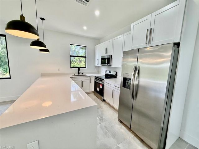 1122 Craft ST E, Lehigh Acres, FL 33974