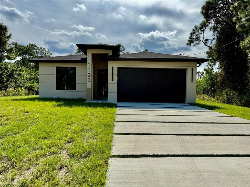 1122 Craft ST E, Lehigh Acres, FL 33974