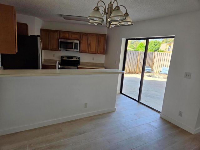 22 Springdale Circle, Palm Springs, FL 33461