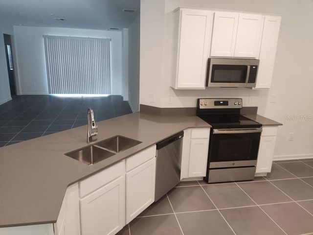 1058 JOHN JACOB ROAD, Davenport, FL 33837