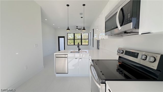 1561 Meadow RD, Lehigh Acres, FL 33976