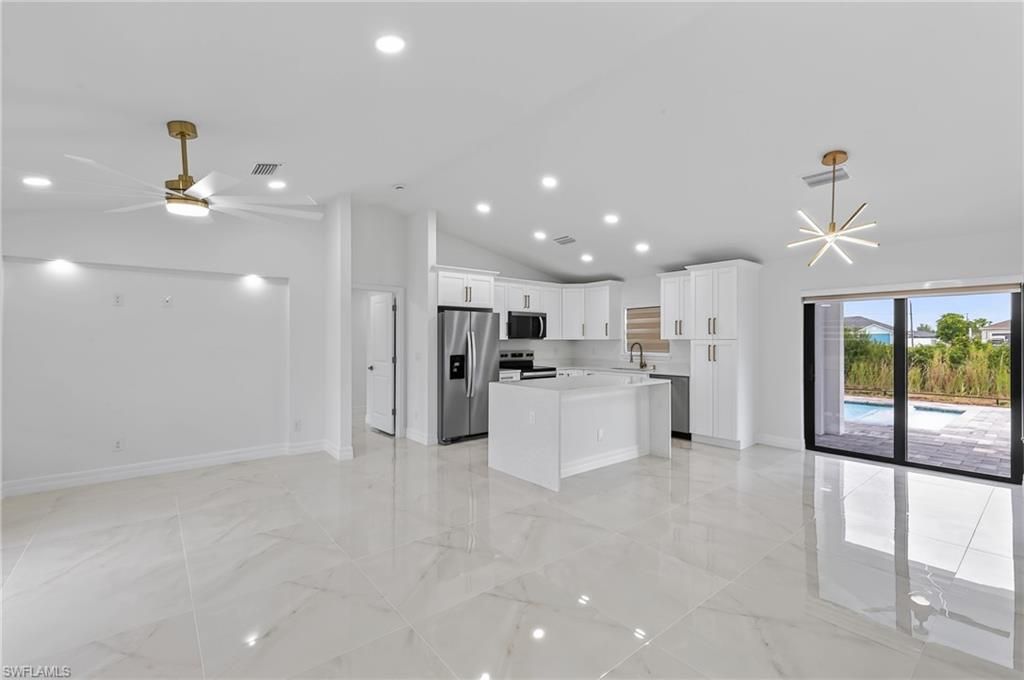 927 NE 32nd TER, CAPE CORAL, FL 33909 — photo 5
