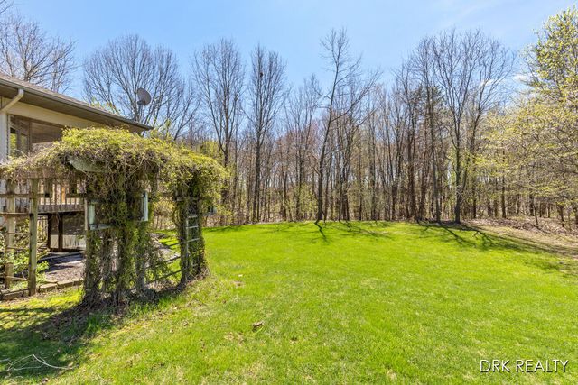5900 Cannon Hills Drive NE, Ada, MI 49301