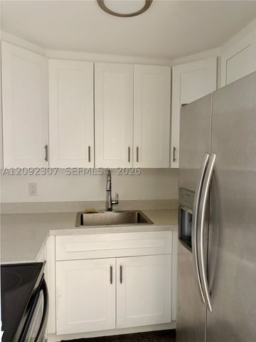 5050 NW 7th St 309, Miami, FL 33126