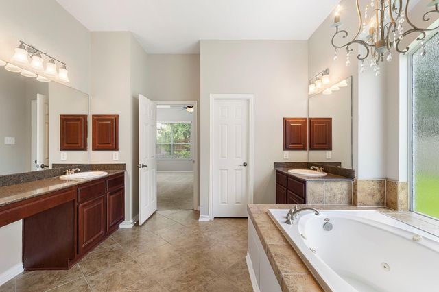 6 Hithervale Court, The Woodlands, TX 77382