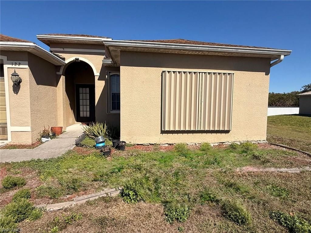 122 Grant BLVD, LEHIGH ACRES, FL 33974 — exterior