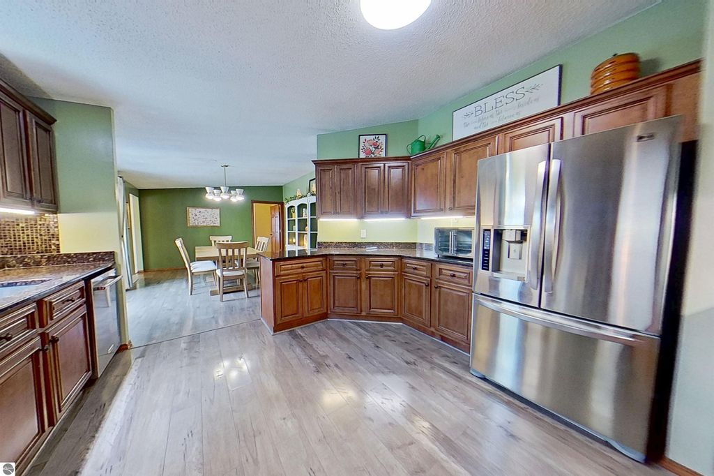 Image 52 of property listing at 5806 W Weidman Road, Weidman, MI 48893