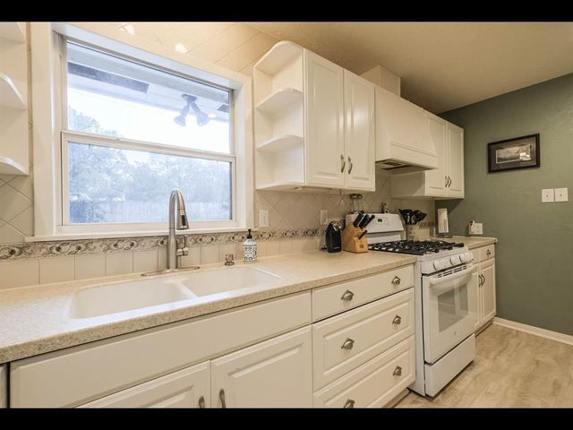 9910 Pine Lake Drive, Houston, TX 77055