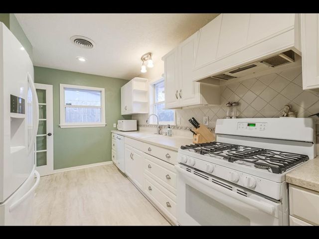 9910 Pine Lake Drive, Houston, TX 77055