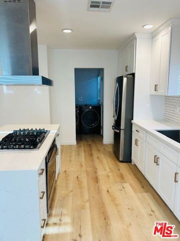 8906 S Harvard Boulevard, Los Angeles, CA 90047