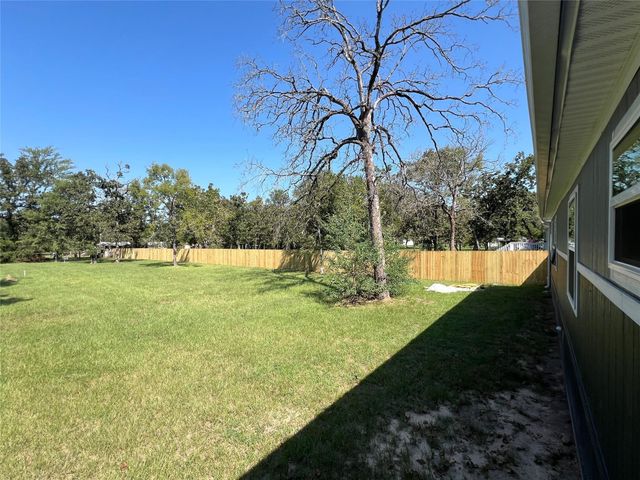 125 Wood Farm Estates Road, Huntsville, TX 77320
