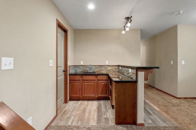 1213 N Lake Ridge Dr, Derby, KS 67037