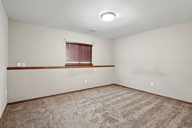 1213 N Lake Ridge Dr, Derby, KS 67037