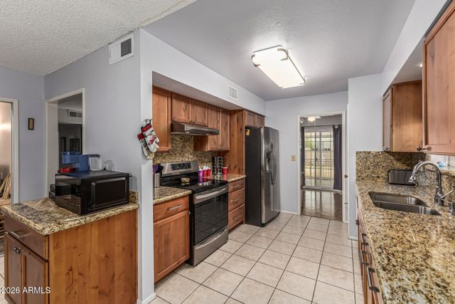 9961 W BOLIVAR Drive, Sun City, AZ 85351