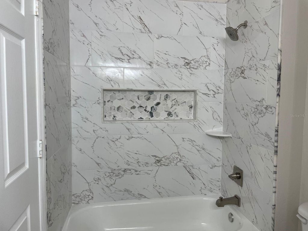 Image 12 of property listing at 6673 TIME SQUARE AVENUE 102, Orlando, FL 32835