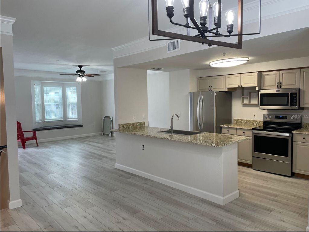 Image 4 of property listing at 6673 TIME SQUARE AVENUE 102, Orlando, FL 32835