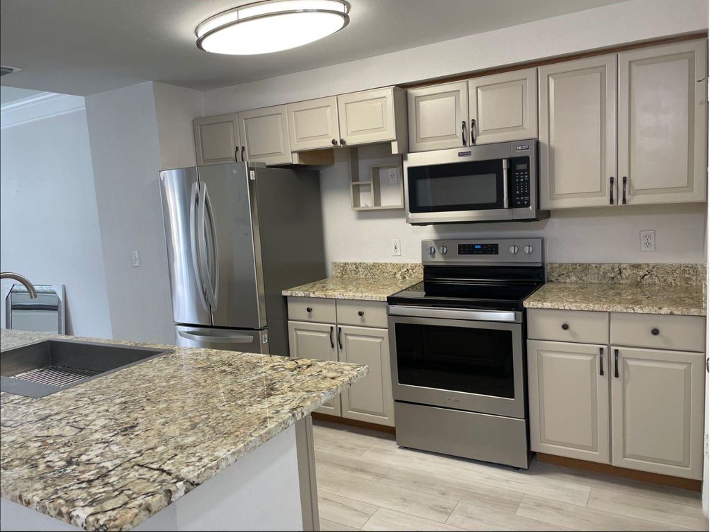 Image 6 of property listing at 6673 TIME SQUARE AVENUE 102, Orlando, FL 32835